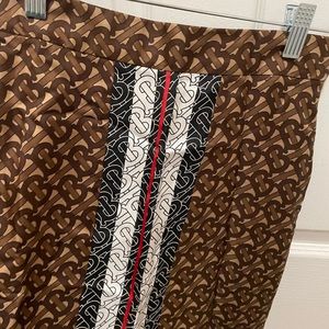 Aline, mid length Burberry silk skirt. Brown and tan color size 2.